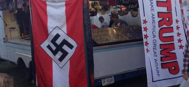 Photo of Bloomsburg Fair vendor with Nazi flag hung next to Trump flag goes viral