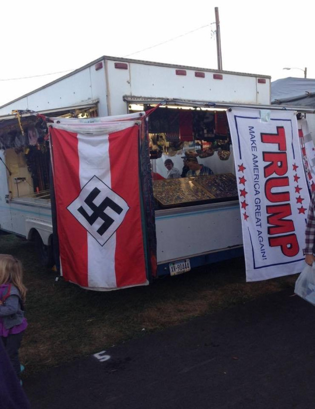 Photo of Bloomsburg Fair vendor with Nazi flag hung next to Trump flag goes viral