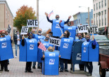 Mailboxes dance, sing, and deliver voting info in downtown Scranton on Oct. 31